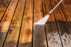 Pressure Washing in progress for a wood deck
